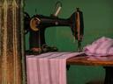 Mending a sari.